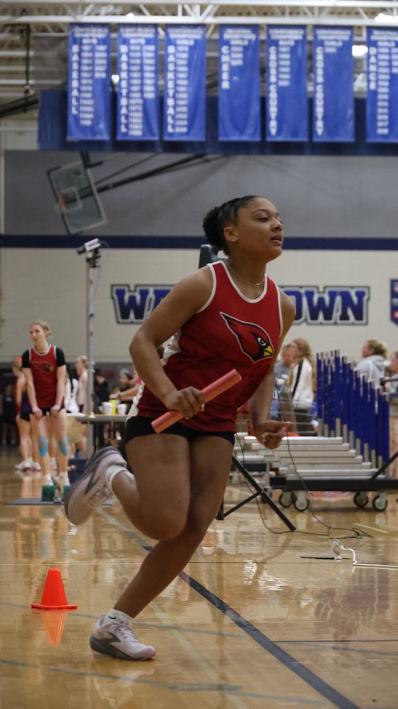 Watertown Indoor Track Meet in Watertown gym with Mayville Cardinal competitors running, relays, hurdles and high jump