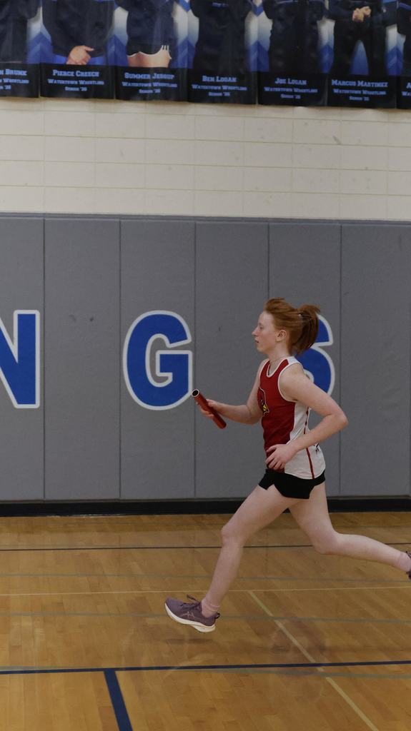 Watertown Indoor Track Meet in Watertown gym with Mayville Cardinal competitors running, relays, hurdles and high jump