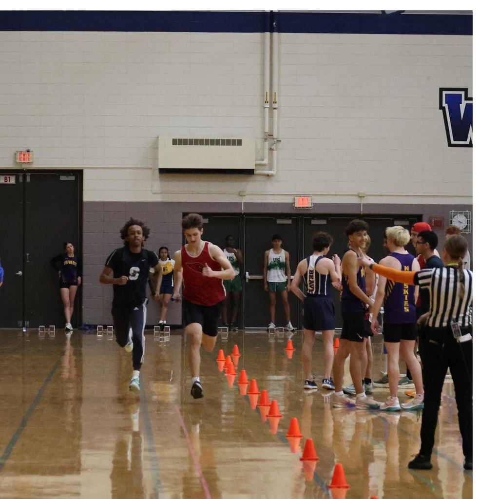 Watertown Indoor Track Meet in Watertown gym with Mayville Cardinal competitors running, relays, hurdles and high jump