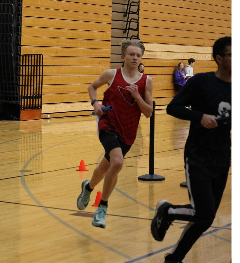 Watertown Indoor Track Meet in Watertown gym with Mayville Cardinal competitors running, relays, hurdles and high jump
