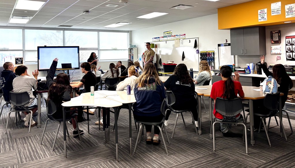 ACP Day Career Fair in MHS gymnasium - students talking with career vendors