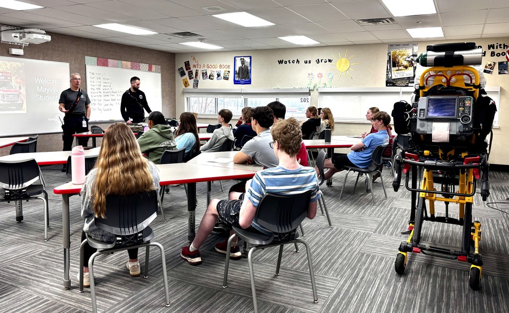 ACP Day Career Fair in MHS gymnasium - students talking with career vendors