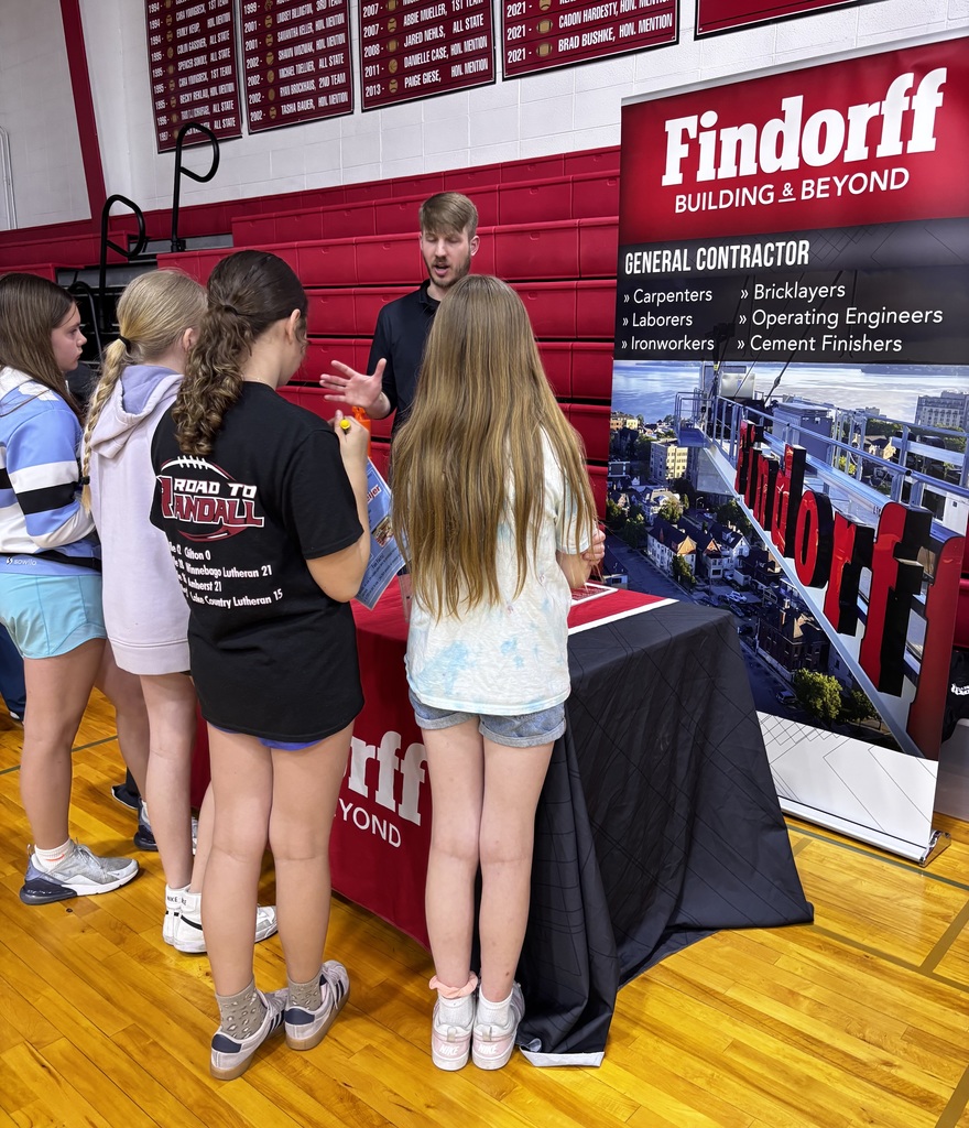 ACP Day Career Fair in MHS gymnasium - students talking with career vendors