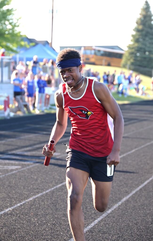High school student track athletes competing at the Conference Track Meet