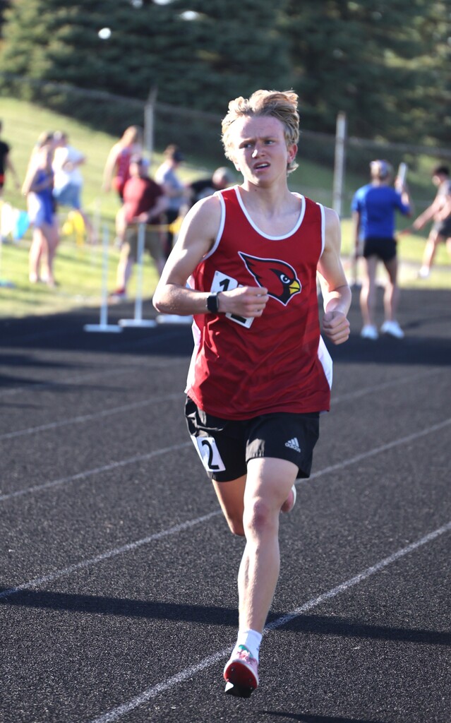 High school student track athletes competing at the Conference Track Meet