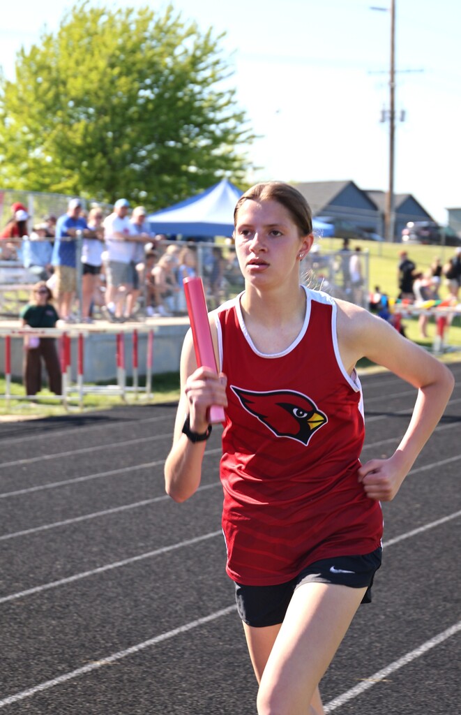 High school student track athletes competing at the Conference Track Meet