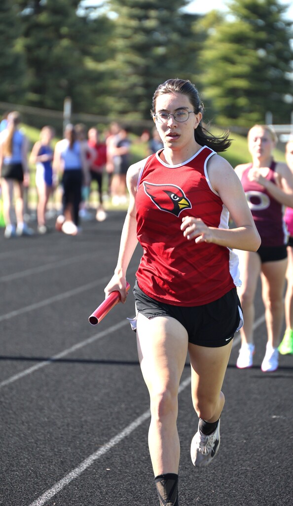High school student track athletes competing at the Conference Track Meet
