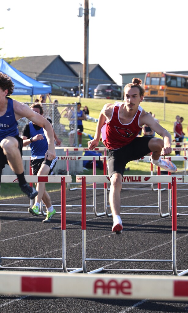 High school student track athletes competing at the Conference Track Meet