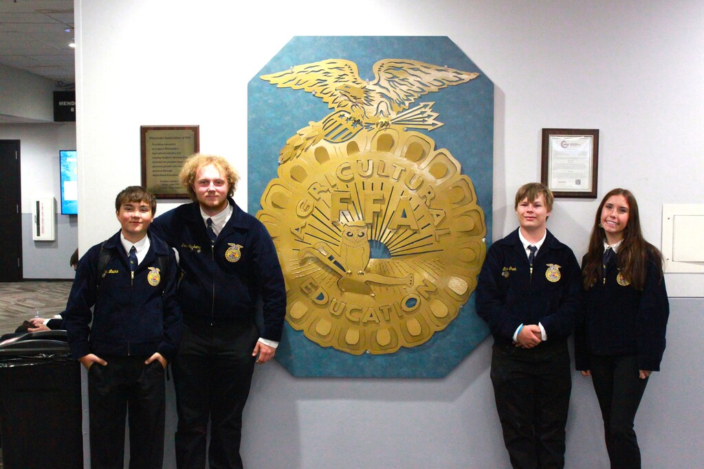 FFA students smiling at FFA State Convention in June
