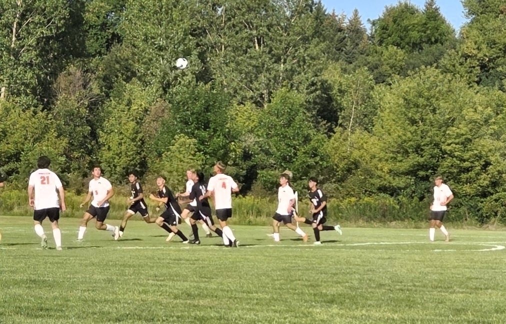 MHS Soccer Team defeated Cedar Grove-Belgium on 8/25 (boys playing on soccer field)