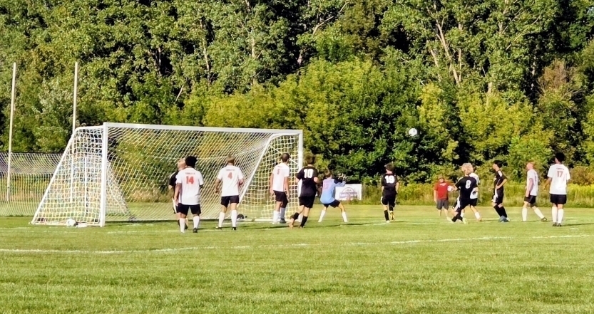 MHS Soccer Team defeated Cedar Grove-Belgium on 8/25 (boys playing on soccer field)