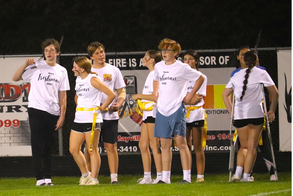 HOCO Powder Puff football action shots