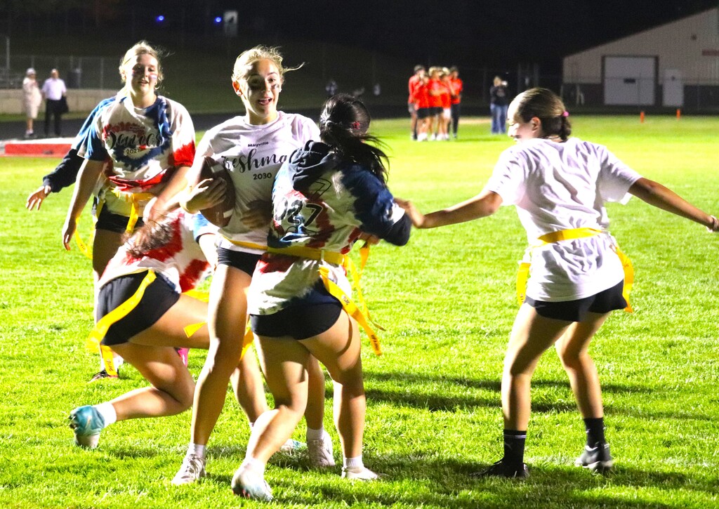 HOCO Powder Puff football action shots