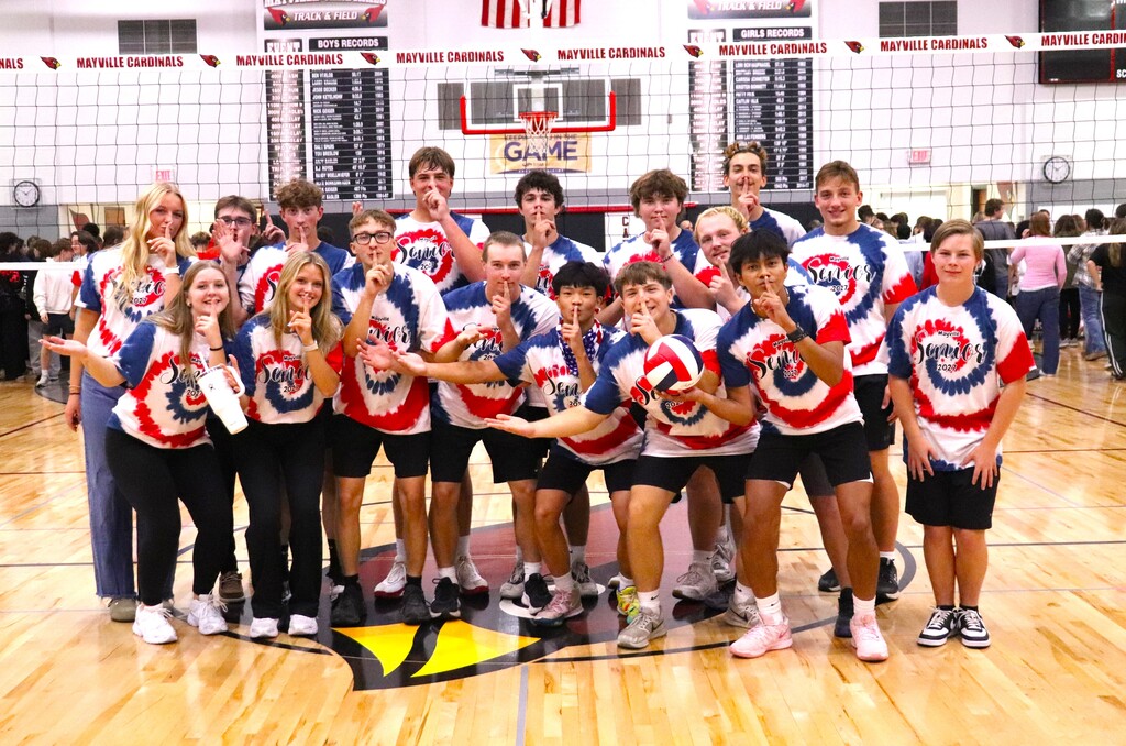 Powder Puff Volleyball 2026 students in class shirts competing in the MHS gym