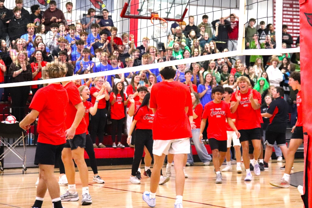 Powder Puff Volleyball 2026 students in class shirts competing in the MHS gym