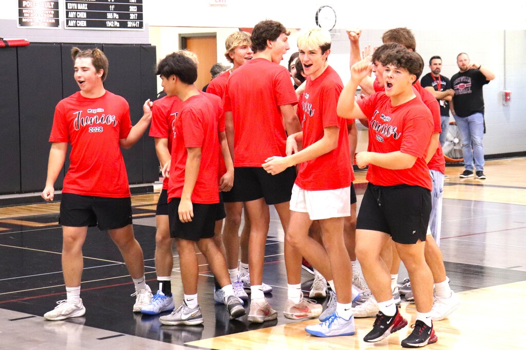 Powder Puff Volleyball 2026 students in class shirts competing in the MHS gym