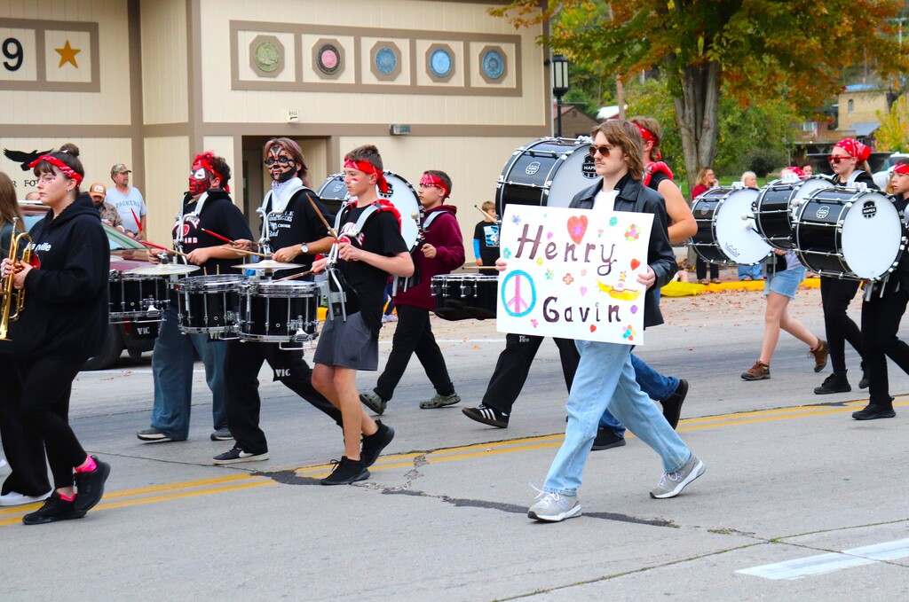 2026 Homecoming Parade down Main St in Mayville with students marching, riding, smiling and school spirit