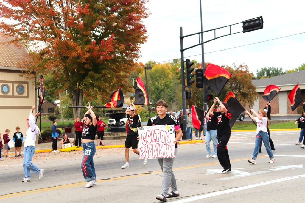 2026 Homecoming Parade down Main St in Mayville with students marching, riding, smiling and school spirit