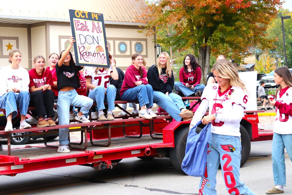 2026 Homecoming Parade down Main St in Mayville with students marching, riding, smiling and school spirit