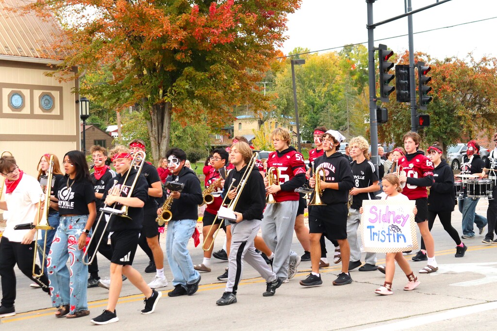 2026 Homecoming Parade down Main St in Mayville with students marching, riding, smiling and school spirit