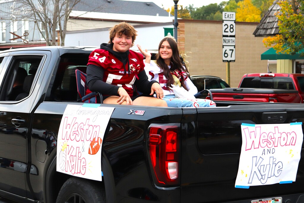 2026 Homecoming Parade down Main St in Mayville with students marching, riding, smiling and school spirit
