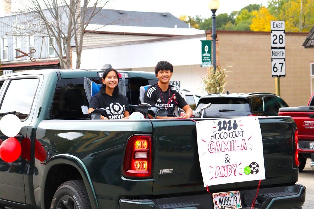 2026 Homecoming Parade down Main St in Mayville with students marching, riding, smiling and school spirit