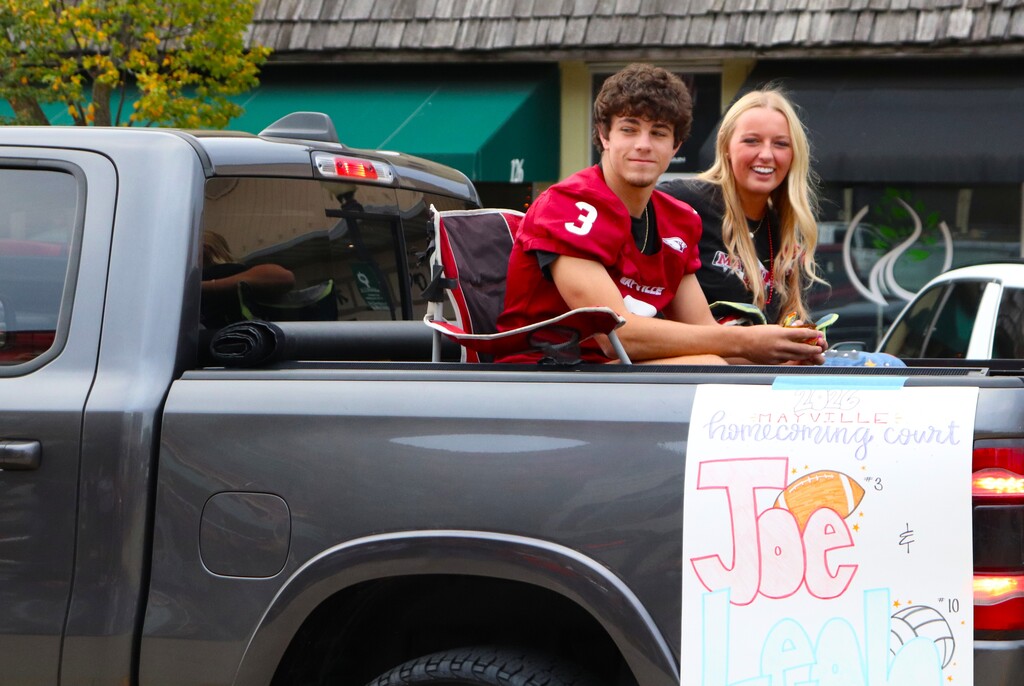 2026 Homecoming Parade down Main St in Mayville with students marching, riding, smiling and school spirit