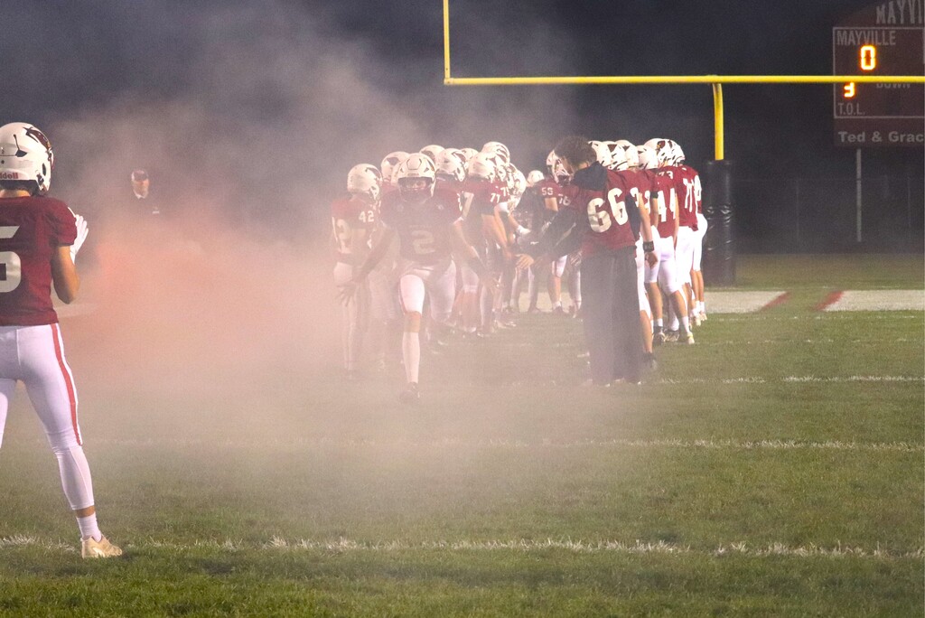 HOCO 2026 Friday Night Football game photos including the pep band, field show, Homecoming court and Big Red