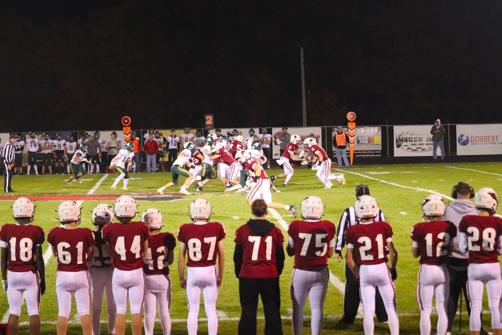 HOCO 2026 Friday Night Football game photos including the pep band, field show, Homecoming court and Big Red