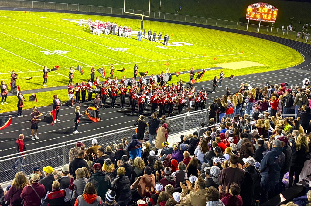 HOCO 2026 Friday Night Football game photos including the pep band, field show, Homecoming court and Big Red