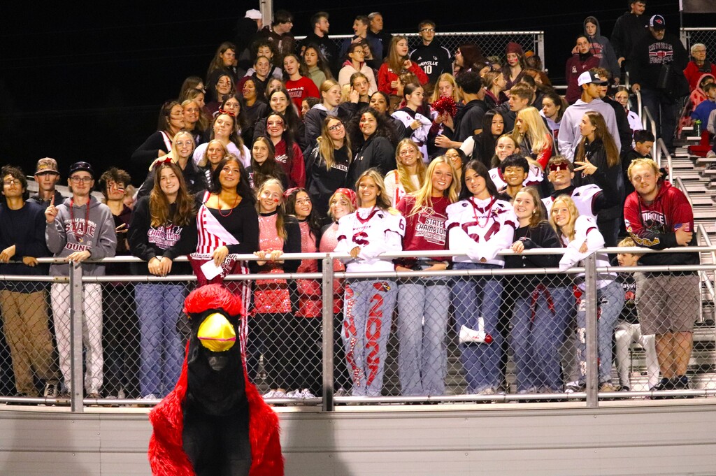 HOCO 2026 Friday Night Football game photos including the pep band, field show, Homecoming court and Big Red