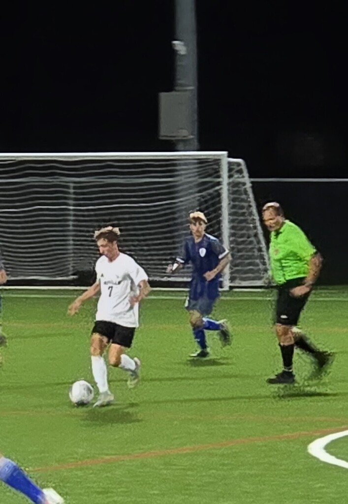 MHS Boys Soccer vs. WLA on 10/13/26 losing a hard fought battle, photos of players on field