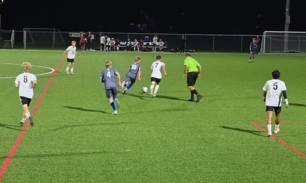 MHS Boys Soccer vs. WLA on 10/13/26 losing a hard fought battle, photos of players on field