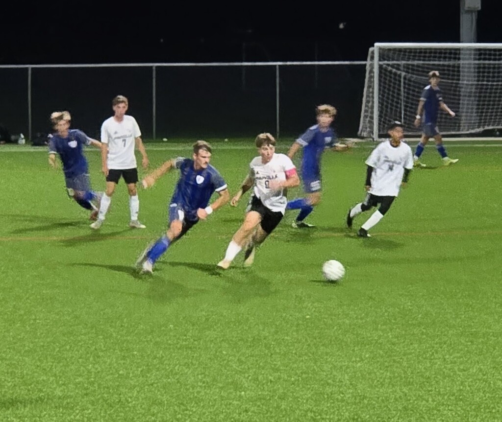 MHS Boys Soccer vs. WLA on 10/13/26 losing a hard fought battle, photos of players on field