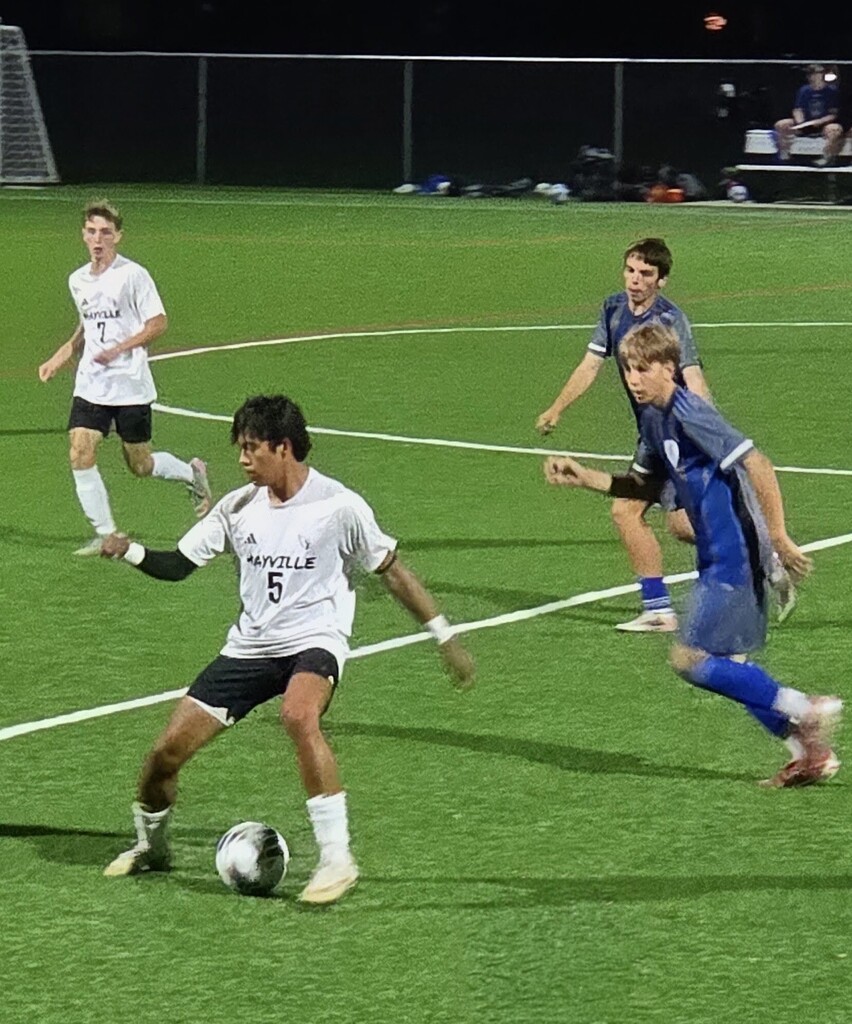 MHS Boys Soccer vs. WLA on 10/13/26 losing a hard fought battle, photos of players on field