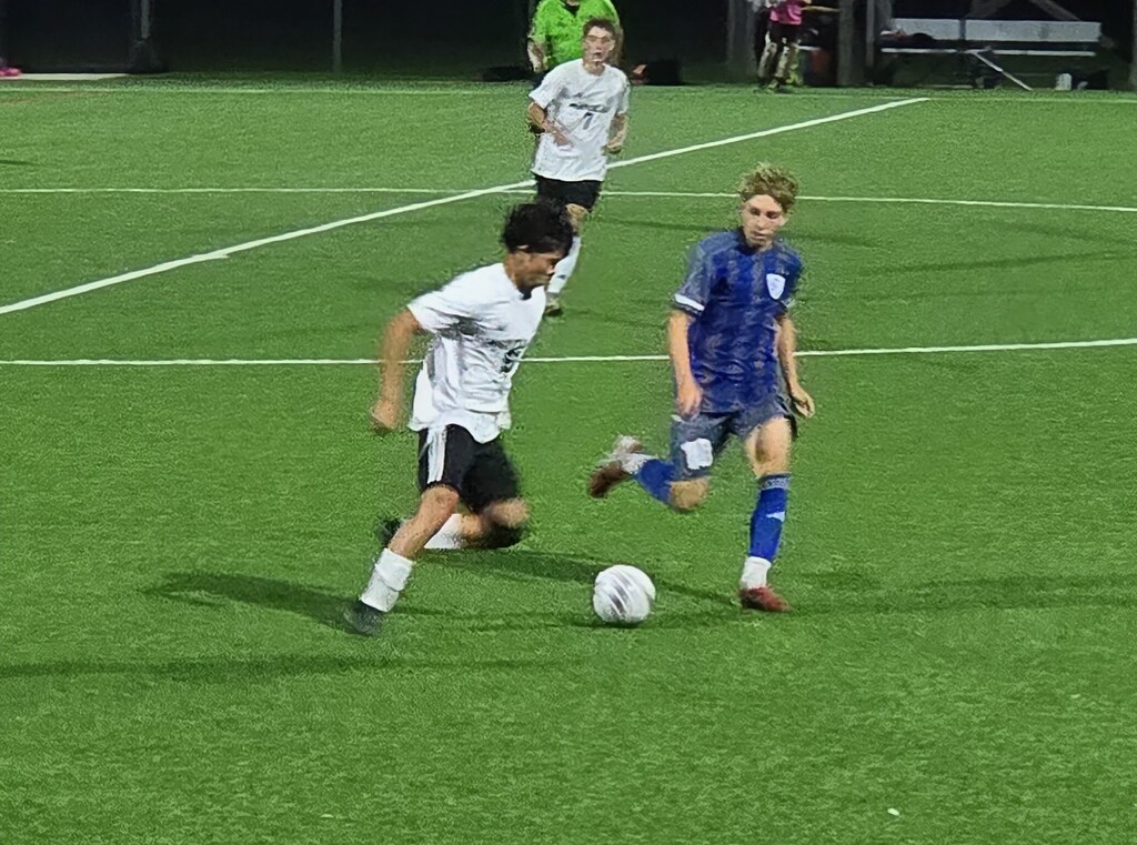 MHS Boys Soccer vs. WLA on 10/13/26 losing a hard fought battle, photos of players on field