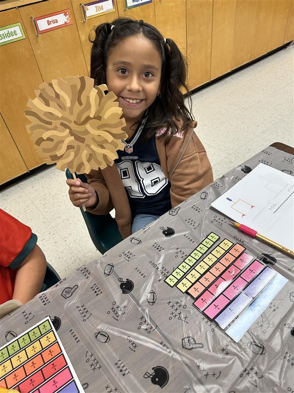 Kids posing for math activity.