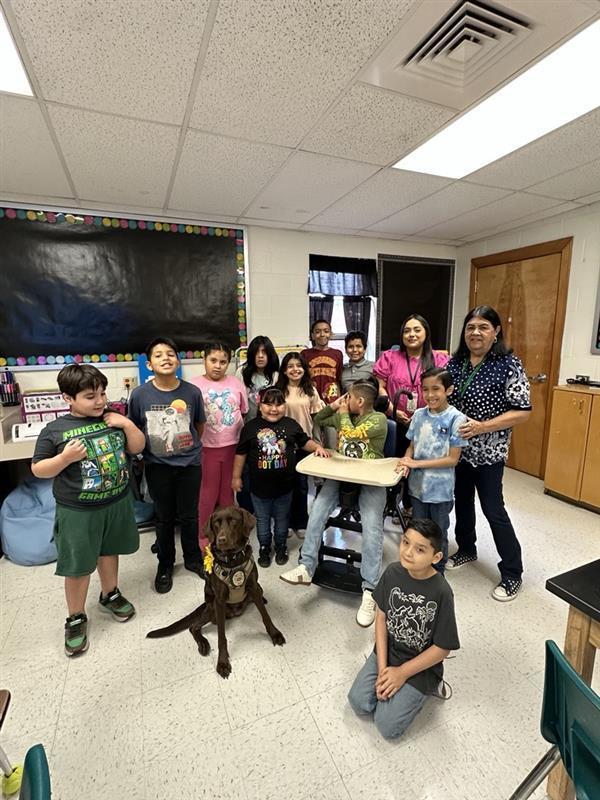 Kids posing with Penny.