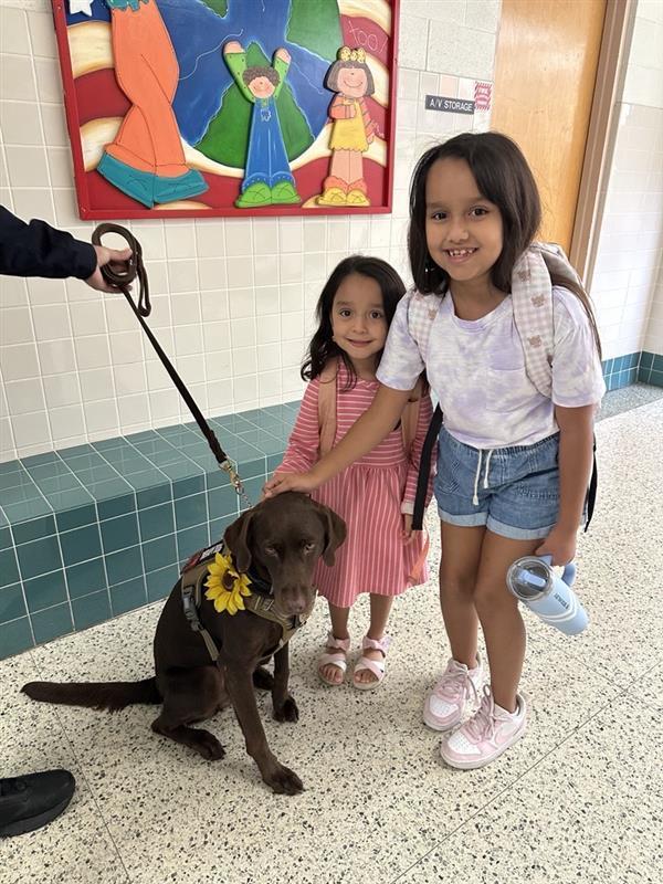 Kids posing with Penny.