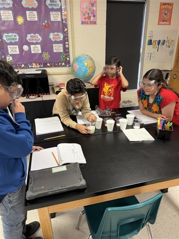 Kids conducting an experiment.