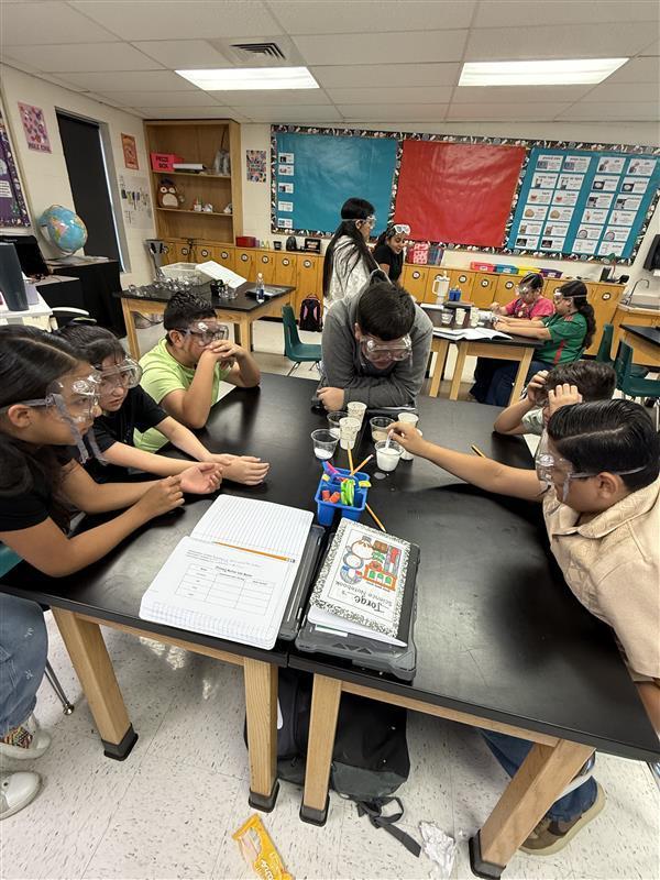 Kids conducting an experiment.