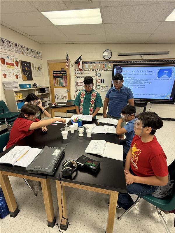Kids conducting an experiment.