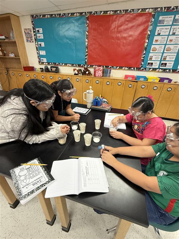 Kids conducting an experiment.