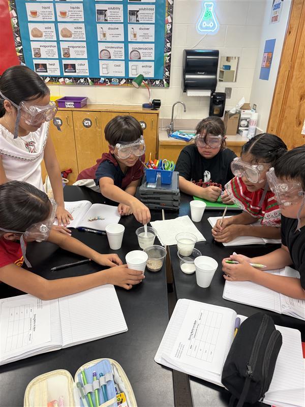 Kids conducting an experiment.