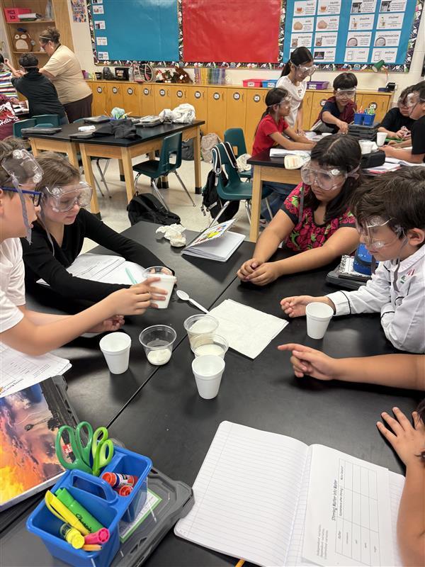 Kids conducting an experiment.