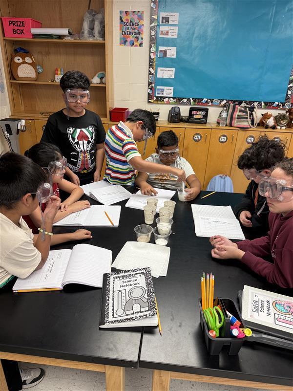 Kids conducting an experiment.