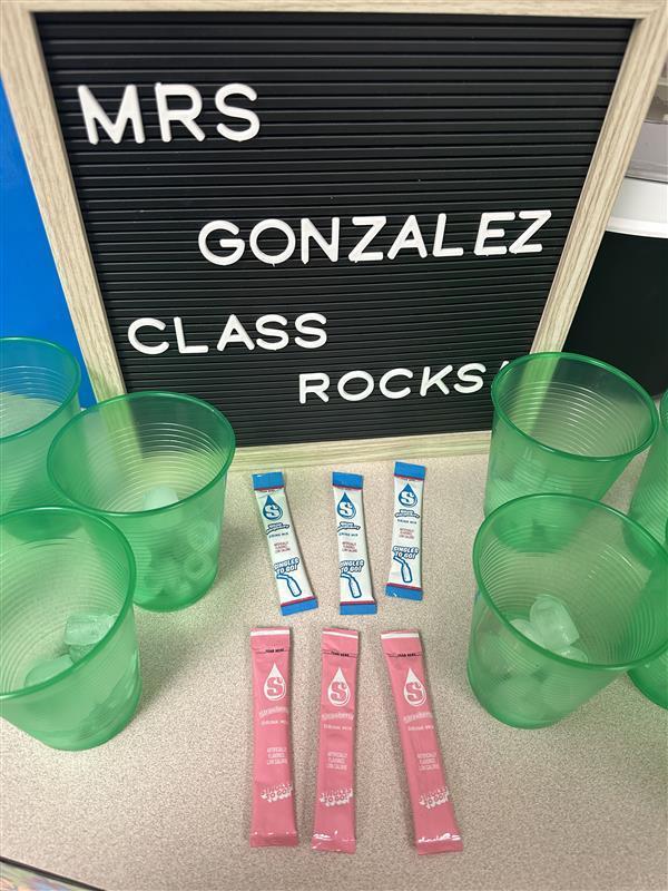 Picture of cups with ice and powdered additive.