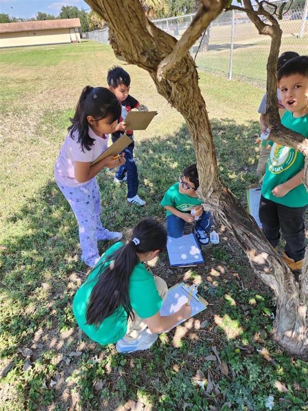 Students completing scavenger hunt activity.