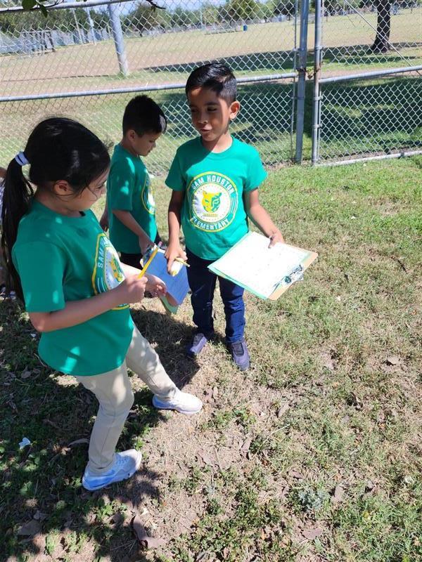 Students completing scavenger hunt activity.