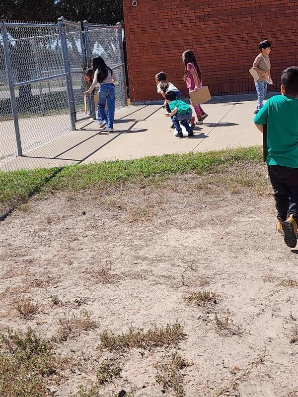 Students completing scavenger hunt activity.